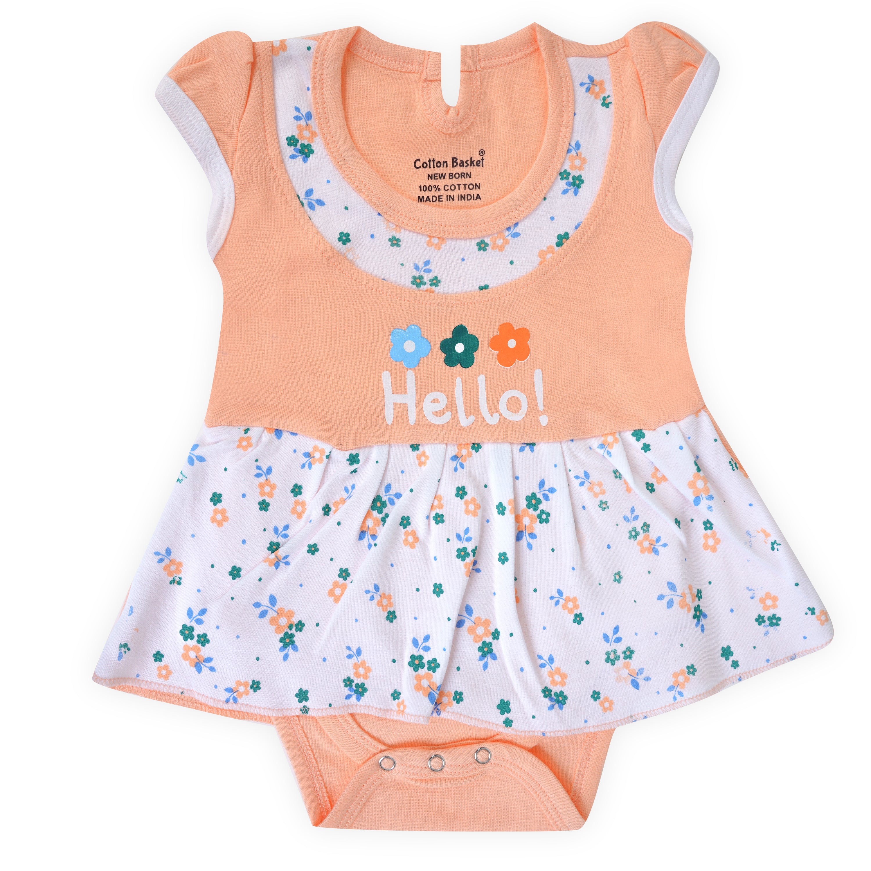 Baby outfit with peach top and floral skirt on a white background