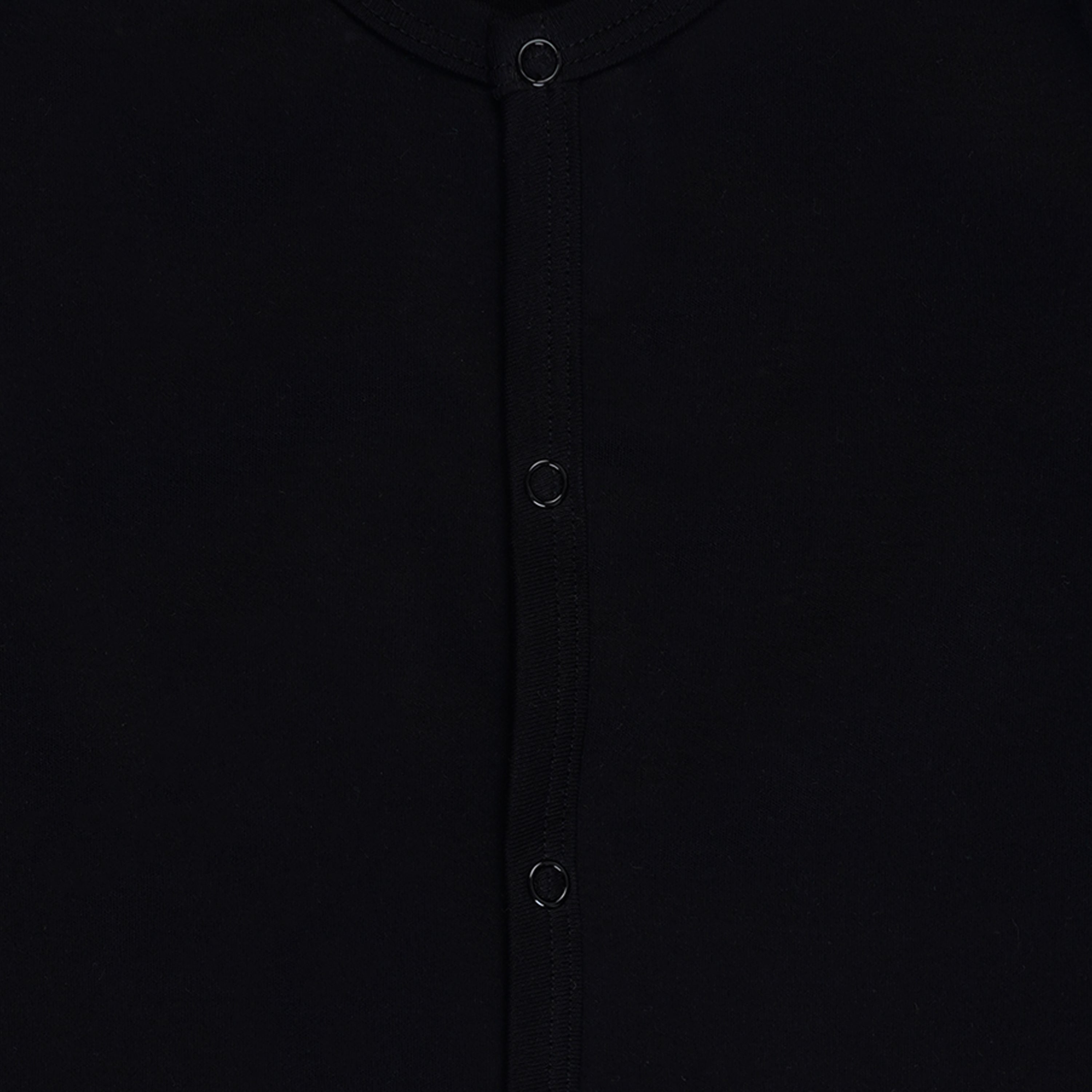 Snap button placket detail on custom manufactured baby romper — Cotton Basket private label manufacturing Tiruppur